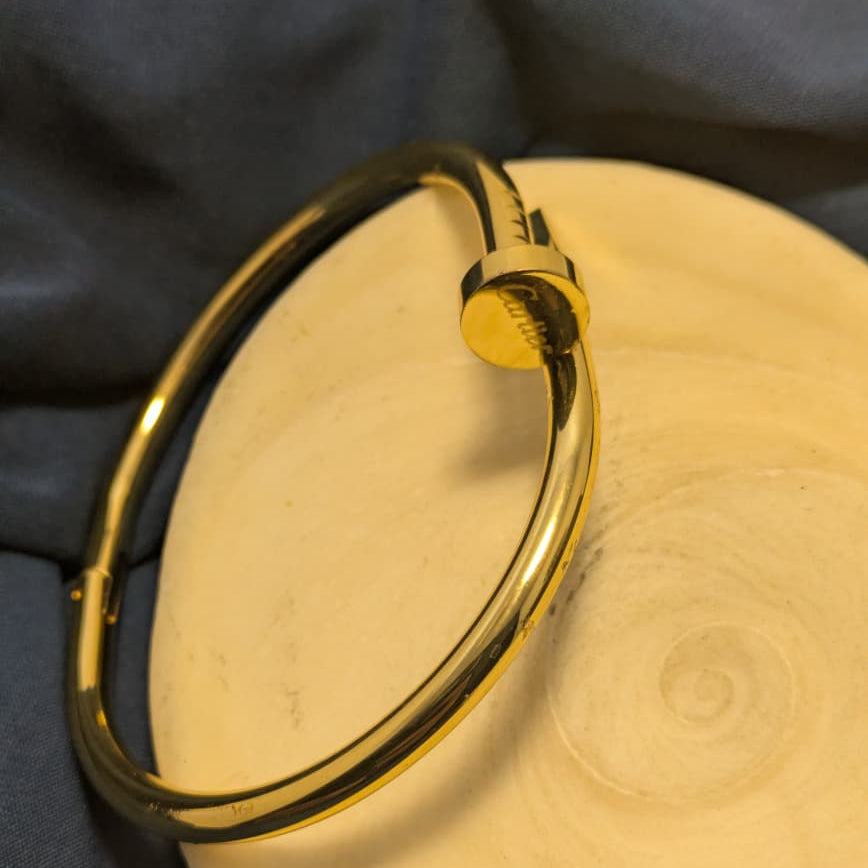 gold Cartier nail  bracelet