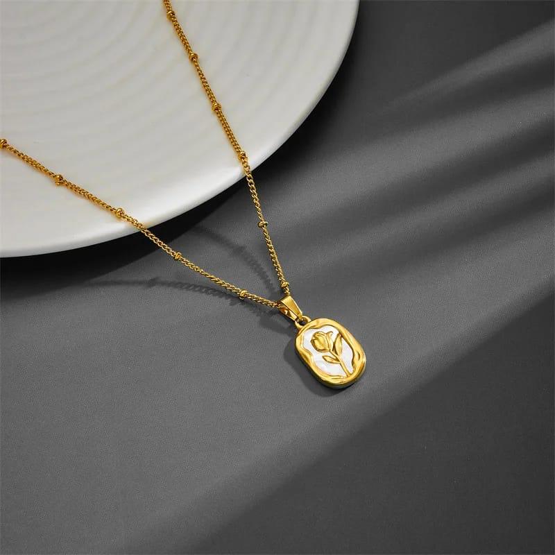 gold-tone rose pendant